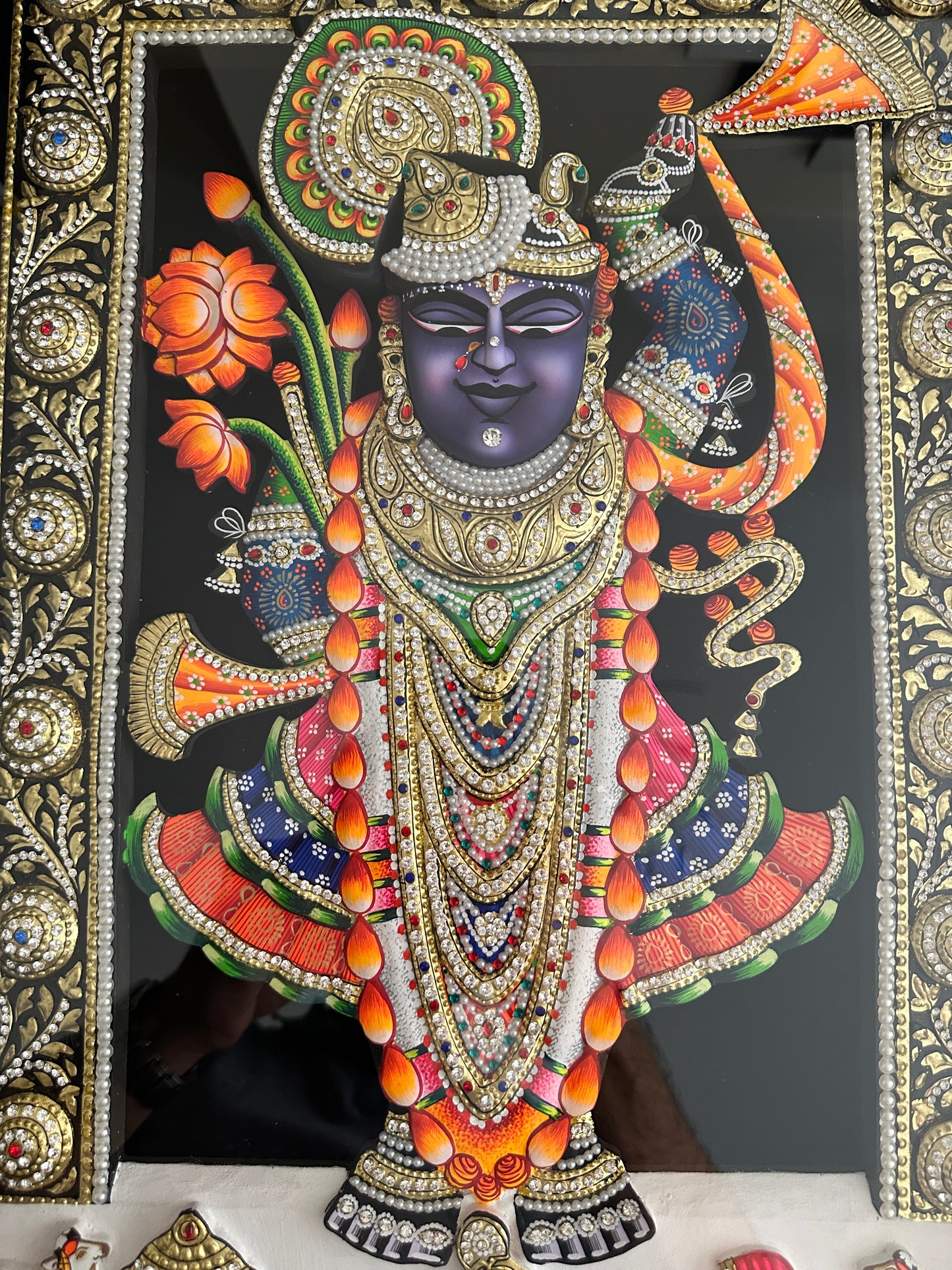Close-up of Rajbhog Shreenathji artwork with Swarovski crystal embellishments