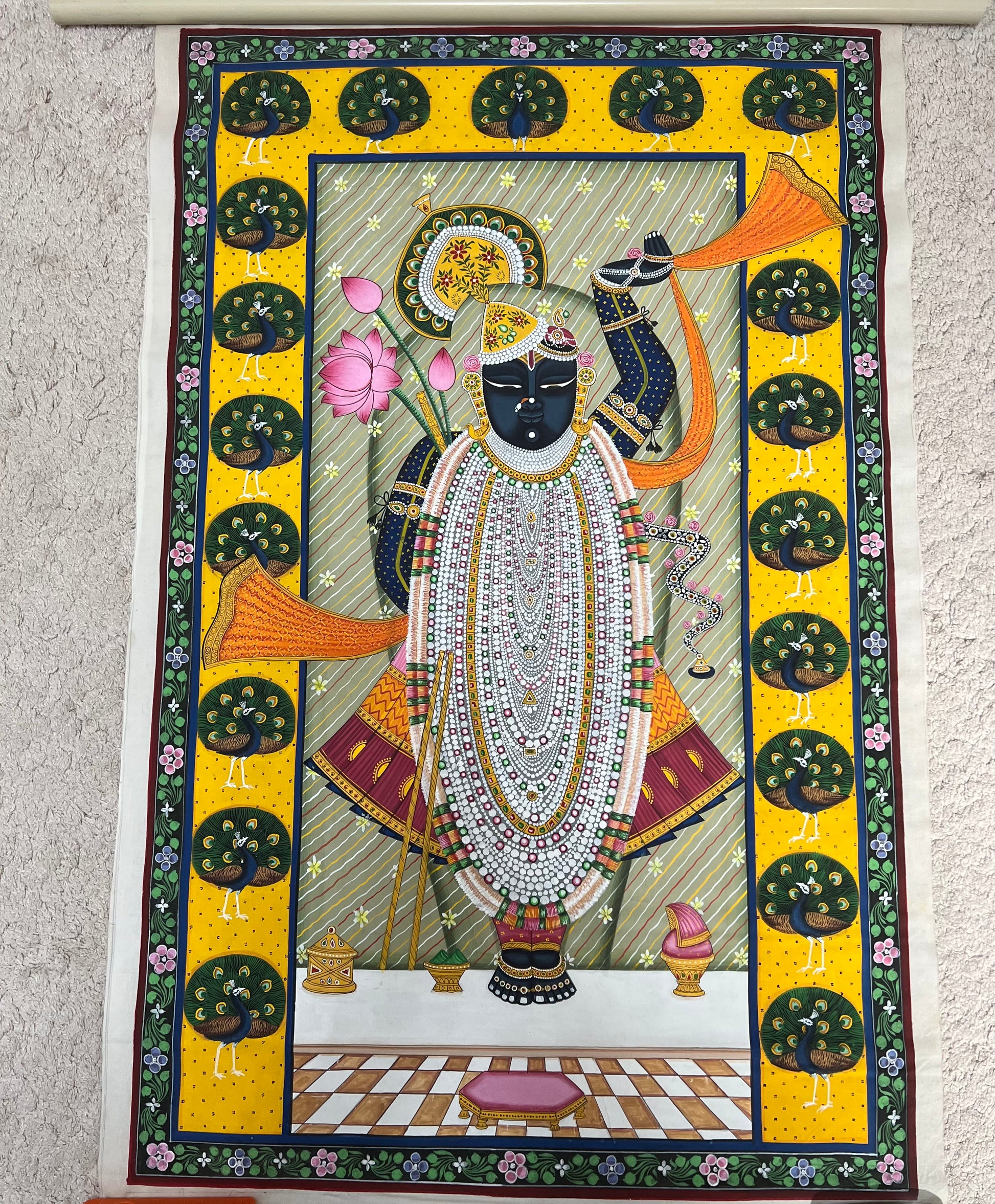 Handpainted Shreenathji Rajbhog Pichwai artwork with peacock border on cotton canvas