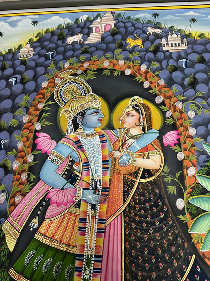 Close-up of Radha-Krishna Pichwai artwork showing gold leaf detailing and fine handpainting