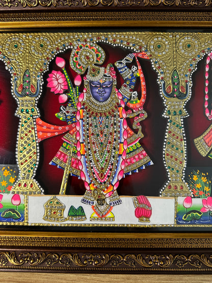 Close-up of raised wooden artwork with Swarovski crystal embellishments