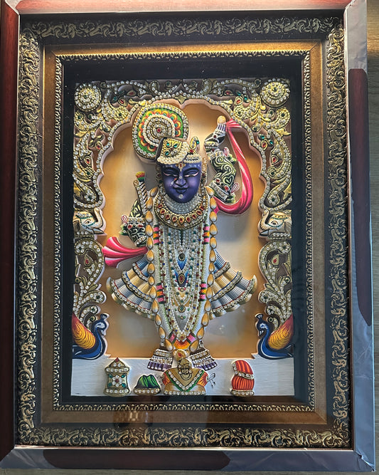 Close-up of Shreenathji 3D artwork showing gold leaf detailing and Swarovski crystal embellishments