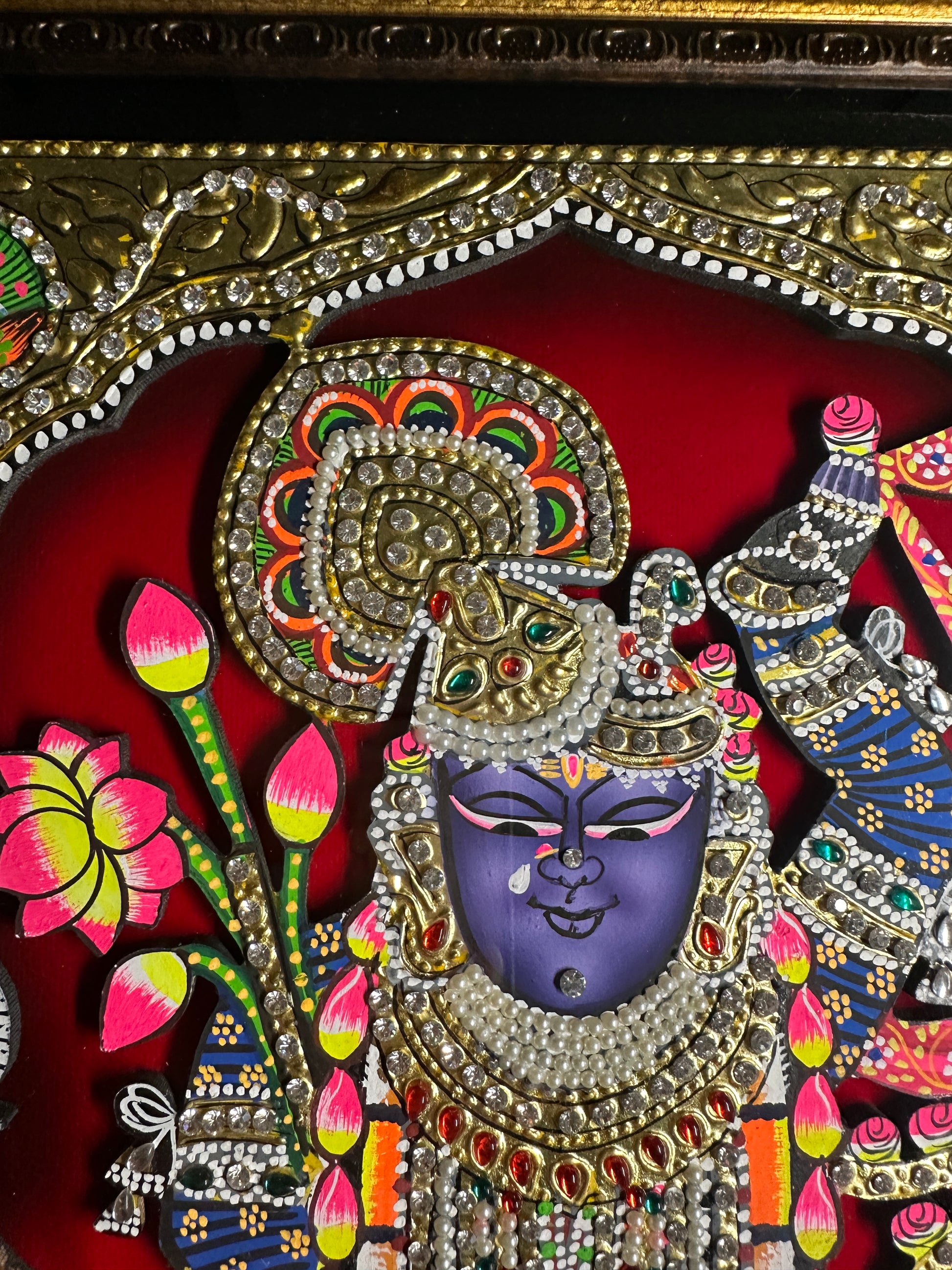 Side view of Shreenathji cut-out wooden artwork showing layered raised effect