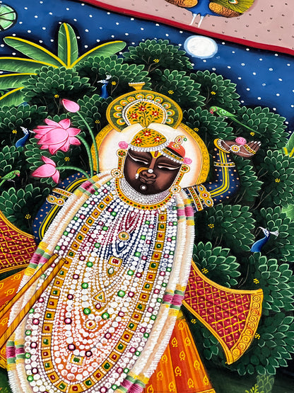 Close-up of handpainted Pichwai artwork showing intricate brushwork and traditional detailing