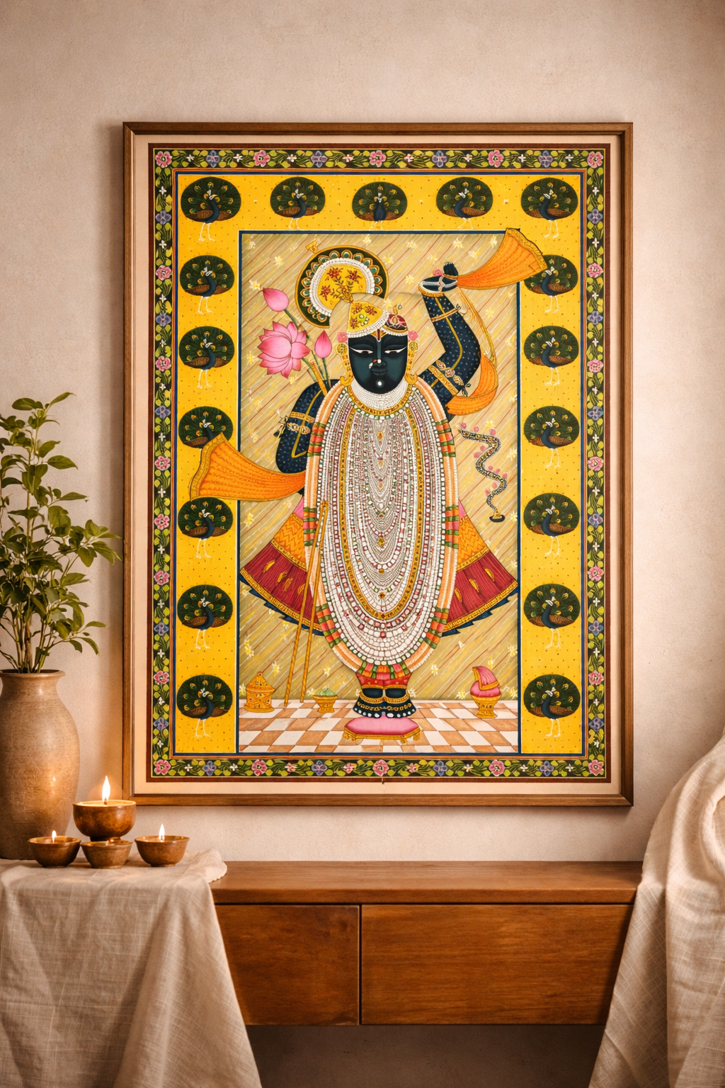 Traditional Shreenathji Pichwai painting with vibrant yellow background and peacock motifs